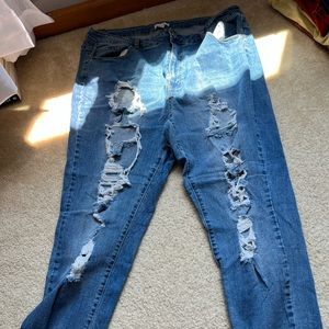 These are forever 21 dark wash, ripped jeans in a size 20.